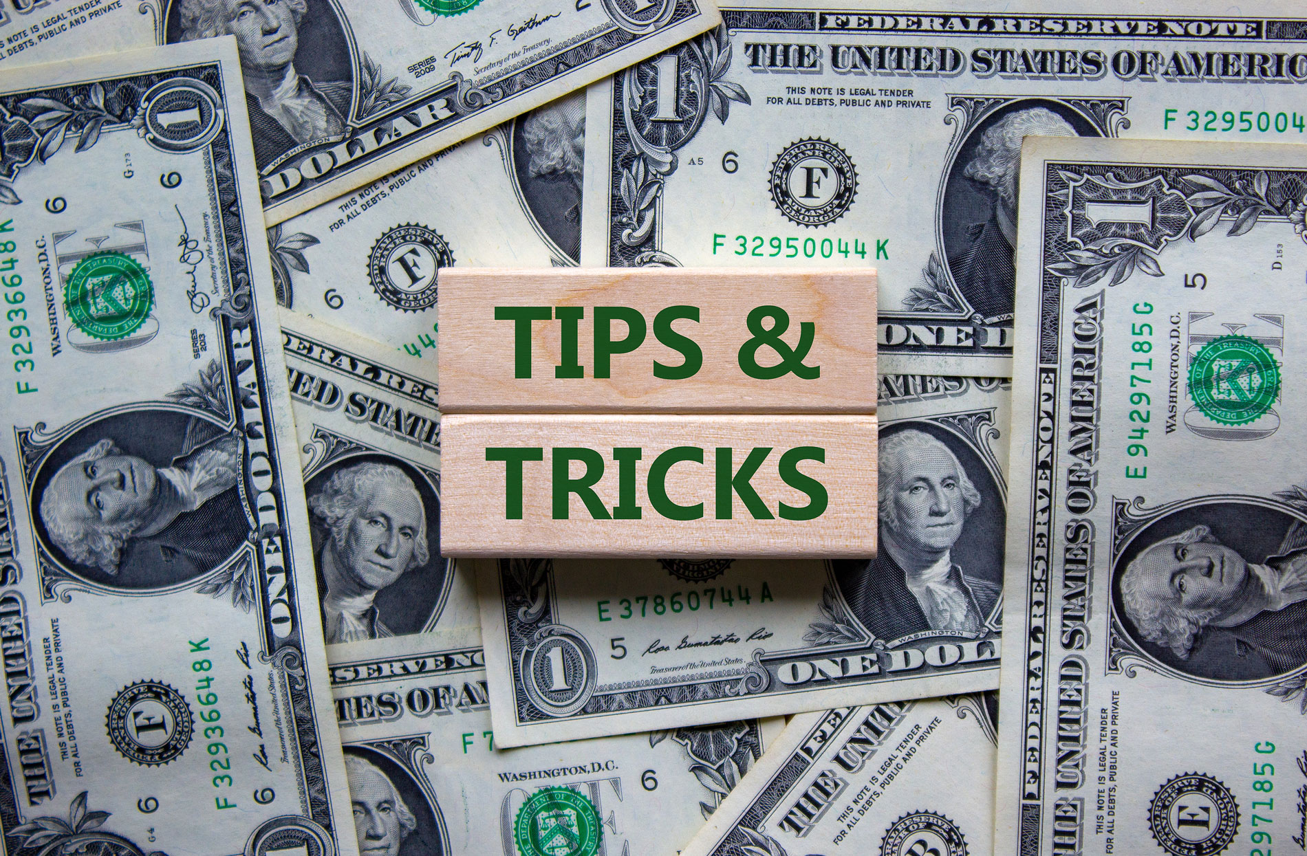 bigstock-Tips-And-Tricks-Symbol-Wooden-406368848